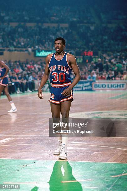 Bernard King of the New York Knicks stands against the Boston Celtics during a game played in 1984 at the Boston Garden in Boston, Massachusetts....