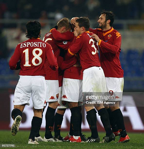 Julio Baptista , Matteo Brighi ,Mirko Vucinic , and Mauro Esposito of AS Roma celebrate the third goal during the Tim Cup between at Roma and...