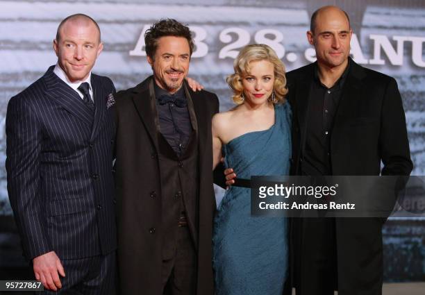 Director Guy Ritchie, actress Rachel McAdams, actor Robert Downey Jr. And actor Mark Strong attend the 'Sherlock Holmes' German Premiere at CineStar...