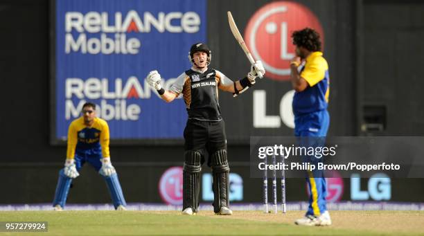 New Zealand's Nathan McCullum celebrates after hitting a six off Sri Lanka's Lasith Malinga to win the ICC World Twenty20 group match between New...