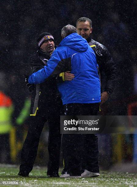 Bristol City manager Gary Johnson and Cardiff manager Dave Jones embrace at the final whistle during the FA Cup sponsored by E.ON 3rd Round match...