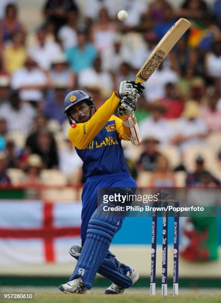 Sri Lanka's Tillakaratne Dilshan hits a boundary during the ICC World Twenty20 Semi Final between England and Sri Lanka at Beausejour Stadium, Gros...