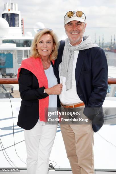 Sabine Christiansen and her husband Norbert Medus are seen on board during the naming ceremony of the cruise ship 'Mein Schiff 1' on May 11, 2018 in...