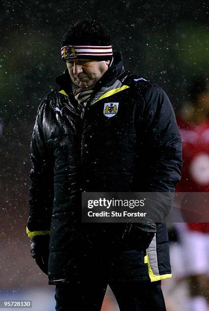 Bristol City manager Gary Johnson leaves the field at the final whistle during the FA Cup sponsored by E.ON 3rd Round match between Bristol City and...
