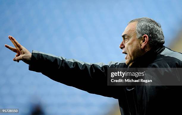 Avram Grant the Portsmouth manager looks on during the FA Cup sponsored by E.ON 3rd round replay match between Coventry City and Portsmouth at the...