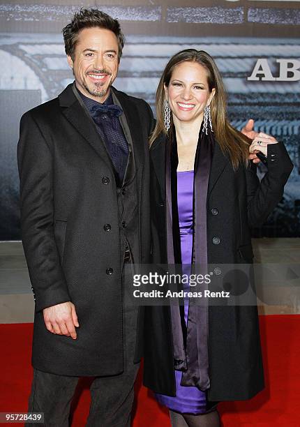 Actor Robert Downey Jr. And his wife and producer Susan Downey attend the 'Sherlock Holmes' German Premiere at CineStar on January 12, 2010 in...