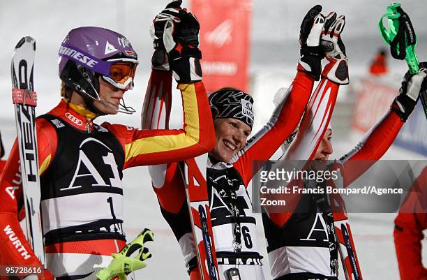 Maria Riesch of Germany takes 2nd place, Marlies Schild of Austria takes 1st place, Kathrin Zettel of Austria takes 3rd place during the Audi FIS...