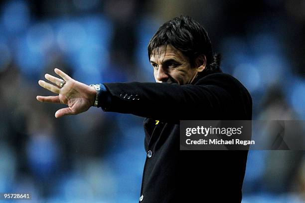 Chris Coleman the Coventry City manager directs his players during the FA Cup sponsored by E.ON 3rd round replay match between Coventry City and...