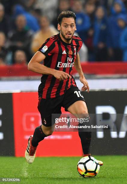 Hakan Calhanoglu of AC Milan in action during the TIM Cup Final between Juventus and AC Milan at Stadio Olimpico on May 9, 2018 in Rome, Italy.