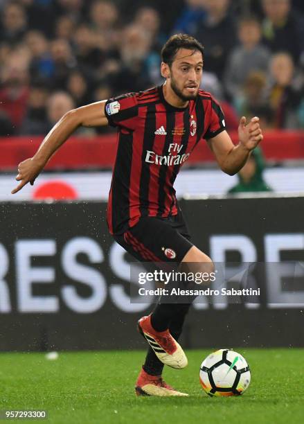 Hakan Calhanoglu of AC Milan in action during the TIM Cup Final between Juventus and AC Milan at Stadio Olimpico on May 9, 2018 in Rome, Italy.