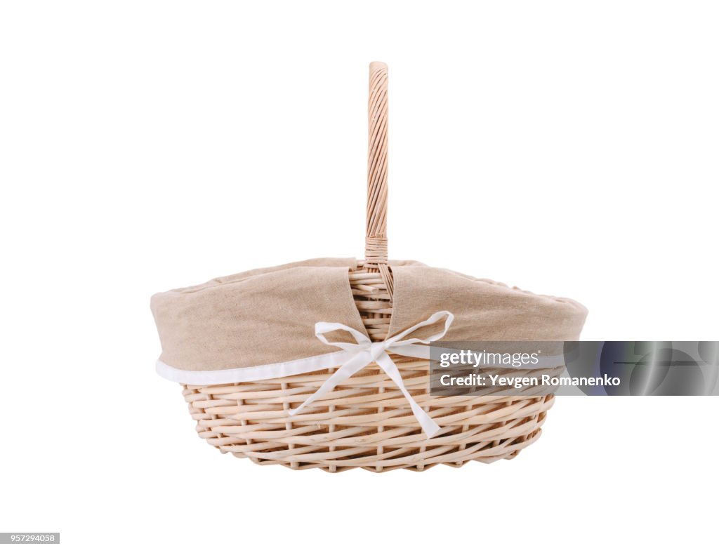 Vintage wicker basket isolated on white background