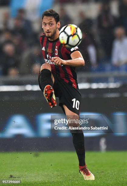 Hakan Calhanoglu of AC Milan in action during the TIM Cup Final between Juventus and AC Milan at Stadio Olimpico on May 9, 2018 in Rome, Italy.