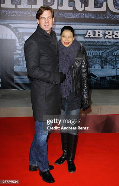 Actor Thomas Heinze and actress Chantal de Freitas attend the 'Sherlock Holmes' German Premiere at CineStar on January 12, 2010 in Berlin, Germany.