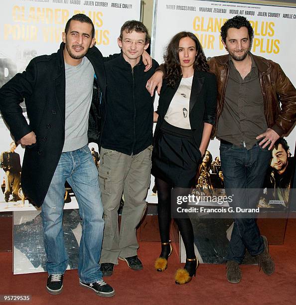 Mourade Zeguendi, Julien Courbey, Amelle Chahbi and Nader Boussandel attend "Les Barons" Paris Premiere at UGC Cine Cite des Halles on January 12,...