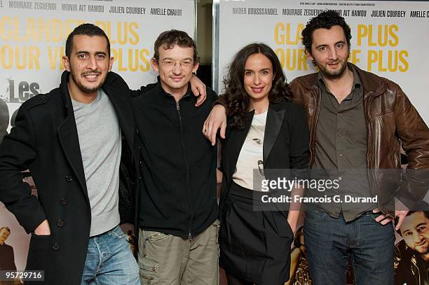 Mourade Zeguendi, Julien Courbey, Amelle Chahbi and Nader Boussandel attend "Les Barons" Paris Premiere at UGC Cine Cite des Halles on January 12,...