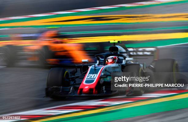 Haas F1 Team's Danish driver Kevin Magnussen takes part in the first practice session at the Circuit de Catalunya in Montmelo in the outskirts of...