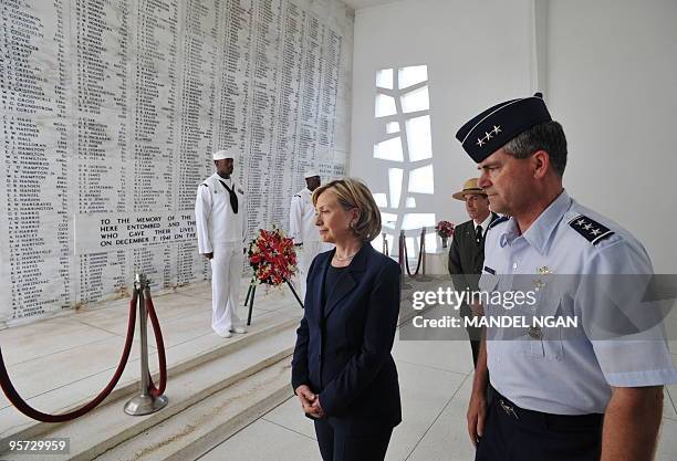 Secretary of State Hillary Clinton visits the USS Arizona Memorial at Pearl Harbor in Honolulu January 12, 2010. The memorial marks the resting place...