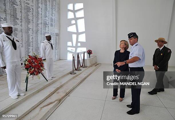Secretary of State Hillary Clinton visits the USS Arizona Memorial at Pearl Harbor in Honolulu January 12, 2010. The memorial marks the resting place...