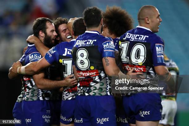 Adam Elliot of the Bulldogs celebrates scoring a try with team mates during the round 10 NRL match between the Canterbury Bulldogs and the Parramatta...