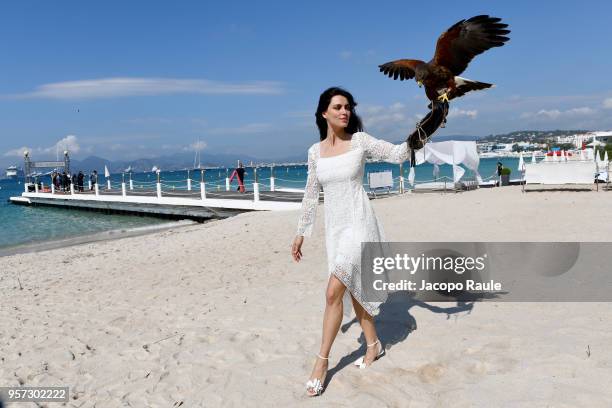 Catrinel Marlon is seen wearing Alberta Ferretti dress, bag and shoes Christian Louboutin during the 71st annual Cannes Film Festival at on May 11,...