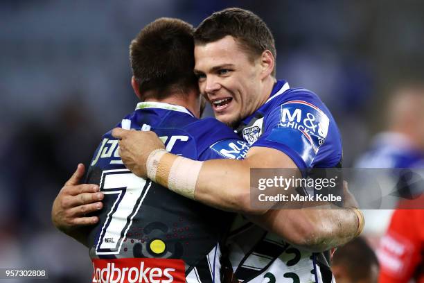 Kieran Foran and Kerrod Holland of the Bulldogs celebrate victory during the round 10 NRL match between the Canterbury Bulldogs and the Parramatta...