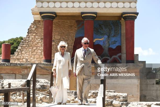 Britain's Prince Charles , the Prince of Wales and Britain's Camilla, the Duchess of Cornwall, arrive at the Archeological site of Knossos, in the...