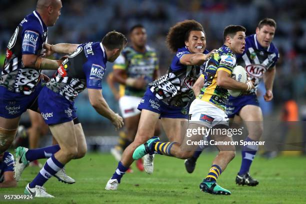 Mitchell Moses of the Eels makes a break during the round 10 NRL match between the Canterbury Bulldogs and the Parramatta Eels at ANZ Stadium on May...