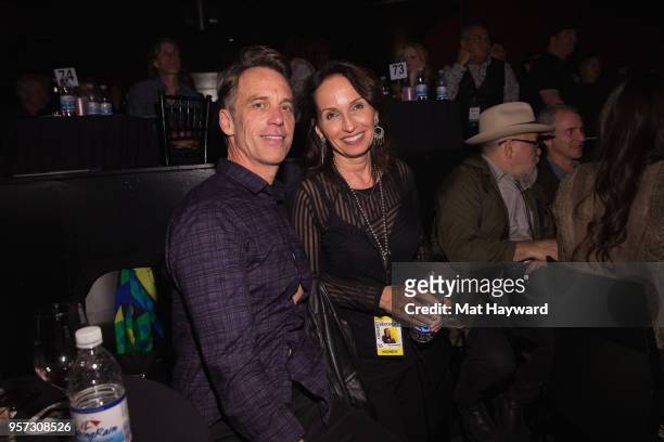 Drummer Matt Cameron of Soundgarden and Pearl Jam with Susan Silver poses for a photo during the MusiCares Concert For Recovery presented by Amazon...