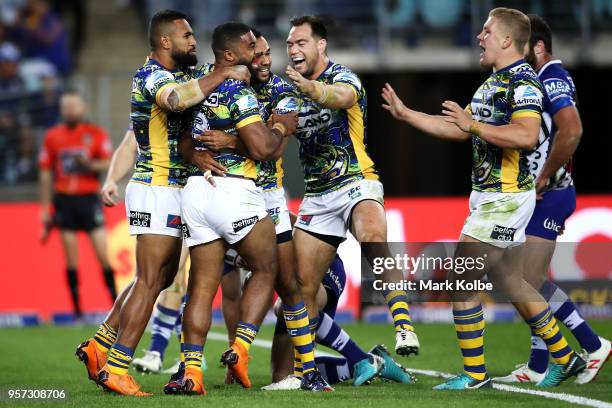 Michael Jennings of the Eels celebrates with his team mates after scoring a try only to have the try disallowed during the round 10 NRL match between...