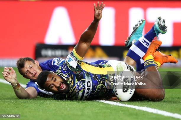 Michael Jennings of the Eels celebrates with his team mates after scoring a try only to have the try disallowed during the round 10 NRL match between...