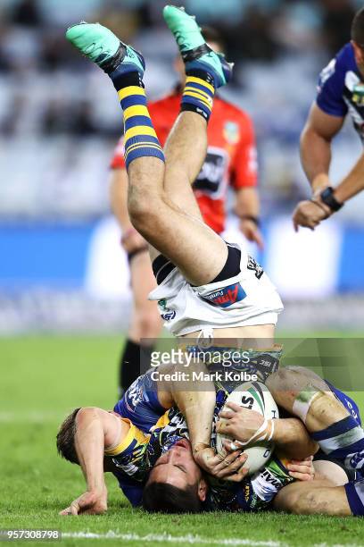 Mitchell Moses of the Eels is tackled during the round 10 NRL match between the Canterbury Bulldogs and the Parramatta Eels at ANZ Stadium on May 11,...