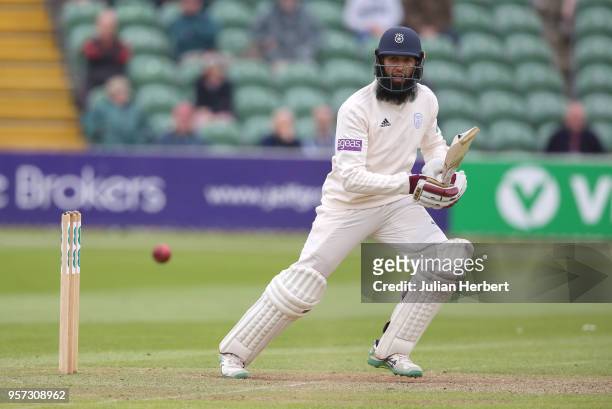 Hashim Amla of Hampshire scores runs during Day One of the Specsavers County Championship Division One match between Somerset and Hampshire at The...