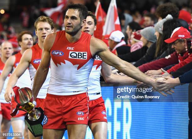 Josh Kennedy of the Swans high fives fans after winning the round eight AFL match between the Hawthorn Hawks and the Sydney Swans at Melbourne...