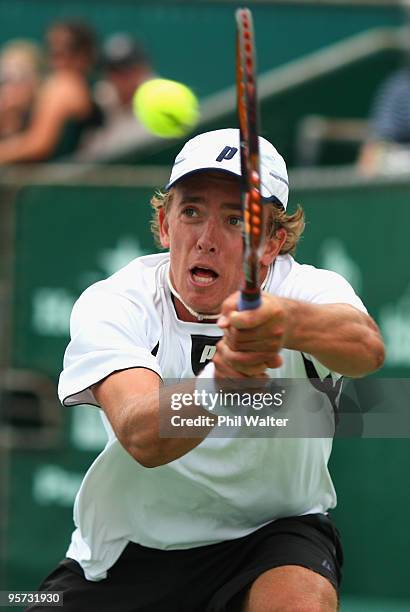 Rubin Statham of New Zealand plays a backhand during his second round match against Albert Montanes of Spain on day three of the Heineken Open at the...