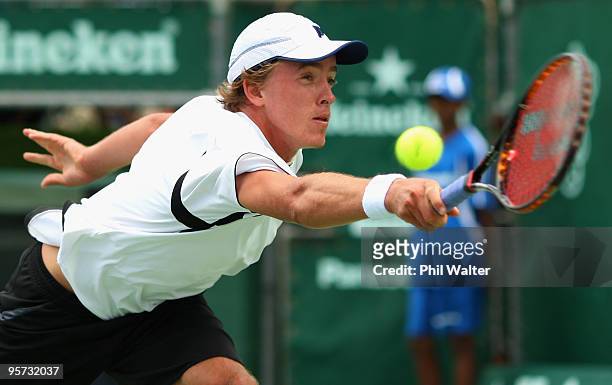 Rubin Statham of New Zealand at full stretch during his second round match against Albert Montanes of Spain on day three of the Heineken Open at the...