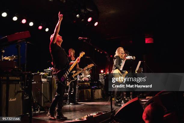 Guitarist Mike McCready of Pearl Jam, Bassist Duff McKagan of Guns and Roses and Nancy Wilson of Heart perform on stage during the MusiCares Concert...