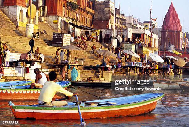 offering on the ganges, varanasi, india - cremation stockfoto's en -beelden