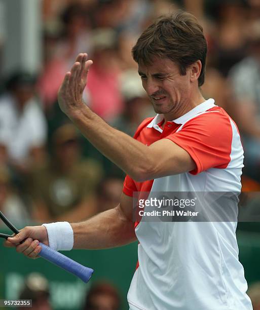 Tommy Robredo of Spain winces after loosing a point during his second round match against Simon Greul of Germany on day three of the Heineken Open at...