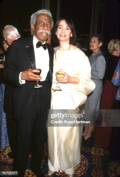 Artist Gordon Parks & designer Gloria Vanderbilt at a gala at the Plaza Hotel in 2000 in New York City, New York.