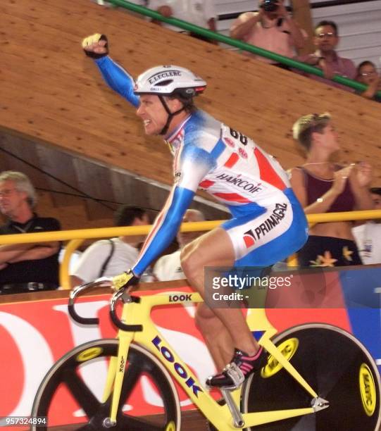 Florian Rousseau of France jubilates after winning his Men's sprint semi-final second heat against US Martin Wayne Nothstein 29 August during the...