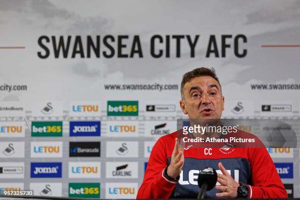 Manager Carlos Carvalhal speaks to reporters during the Swansea City Press Conference at The Fairwood Training Ground on May 11, 2018 in Swansea,...