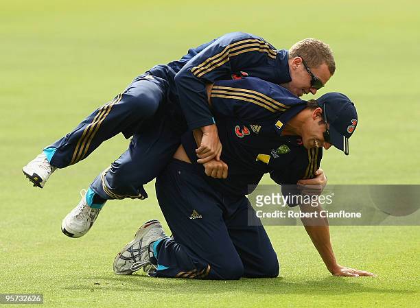 Peter Siddle and Mitchell Johnson of Australia fool around during an Australian nets session at Bellerive Oval on January 13, 2010 in Hobart,...