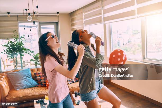 friends having their own show at home - chinese dance imagens e fotografias de stock