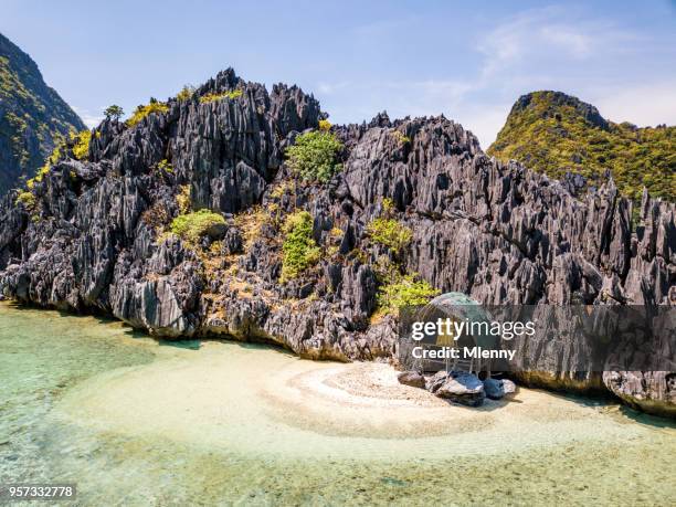 lonely beach hut tapiutan island el nido palawan philippines - palawan island stock pictures, royalty-free photos & images