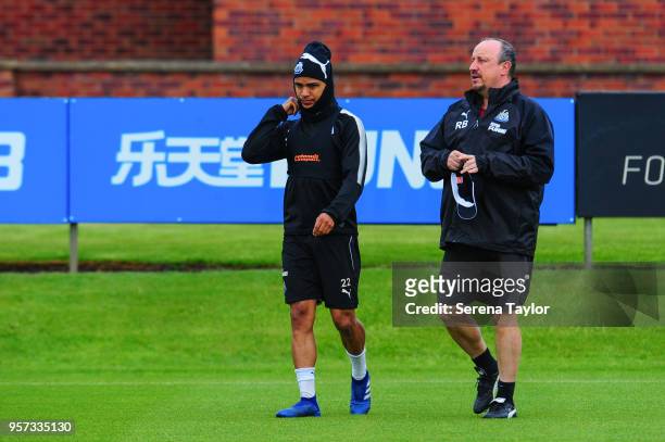 DeAndre Yedlin and Newcastle United Manager Rafael Benitez walk outside during the Newcastle United Training Session at the Newcastle United Training...