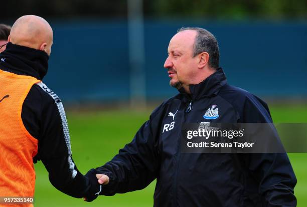 Newcastle United Manager Rafael Benitez shakes hands with Jonjo Shelvey during the Newcastle United Training Session at the Newcastle United Training...