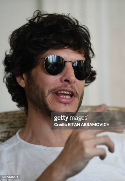 Argentine film director and screenplay writer Luis Ortega gestures during an interview with AFP in Buenos Aires, on May 03, 2018. - Ortega's film, El...
