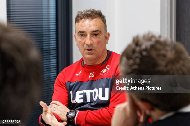 Manager Carlos Carvalhal speaks to reporters during the Swansea City Press Conference at The Fairwood Training Ground on May 11, 2018 in Swansea,...