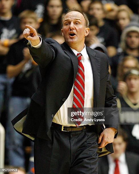 Thad Matta the Head Coach of the Ohio State Buckeyes gives instructions to his team during the Big Ten game against the Purdue Boilermakers at Mackey...