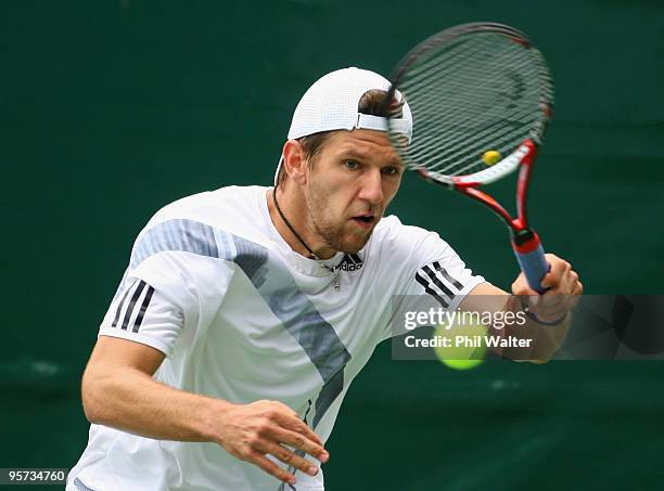 Jurgen Melzer of Austria plays a forehand during his second round match against Sebastien Grosjean of France on day three of the Heineken Open at the...